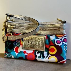 Coach, colourful clutch with gold accents.